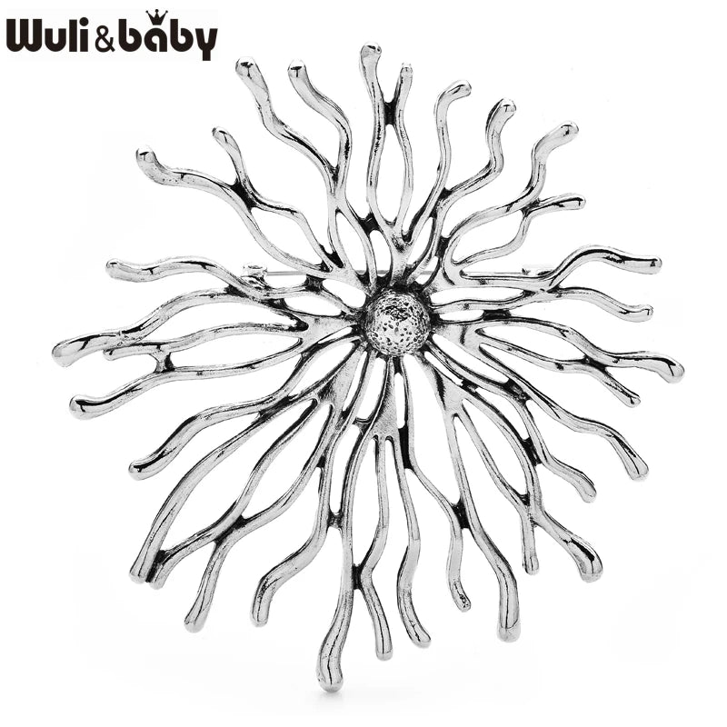 soleil brillance broches